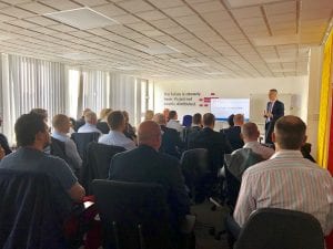 Director Digital presenting to the attendees at bidder day