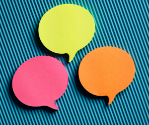 Sticky notes in the shape of a speech bubble