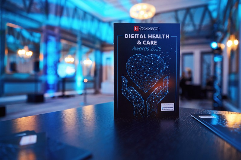 image of card on table showing Digital Health & Care logo