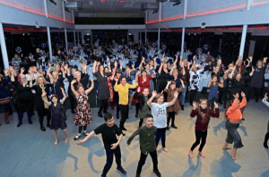 Children and Nurses dancing at the FNP Celebration event