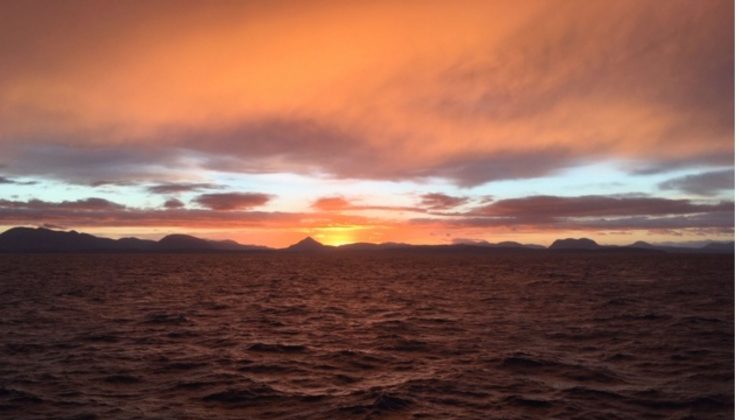 Sun setting at sea