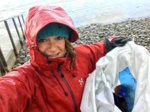 Collector showing bag of beach litter