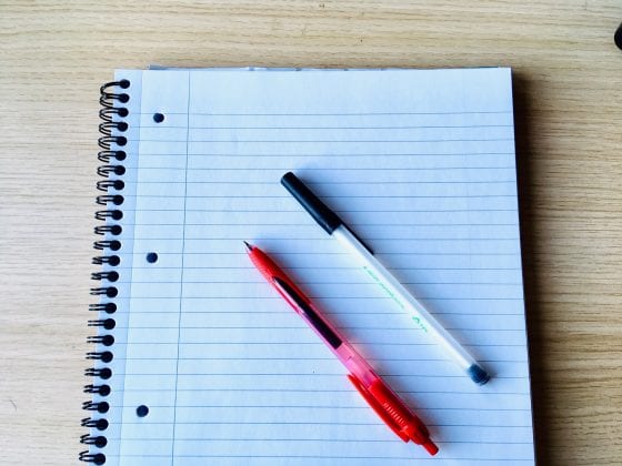 [image of paper and pens]