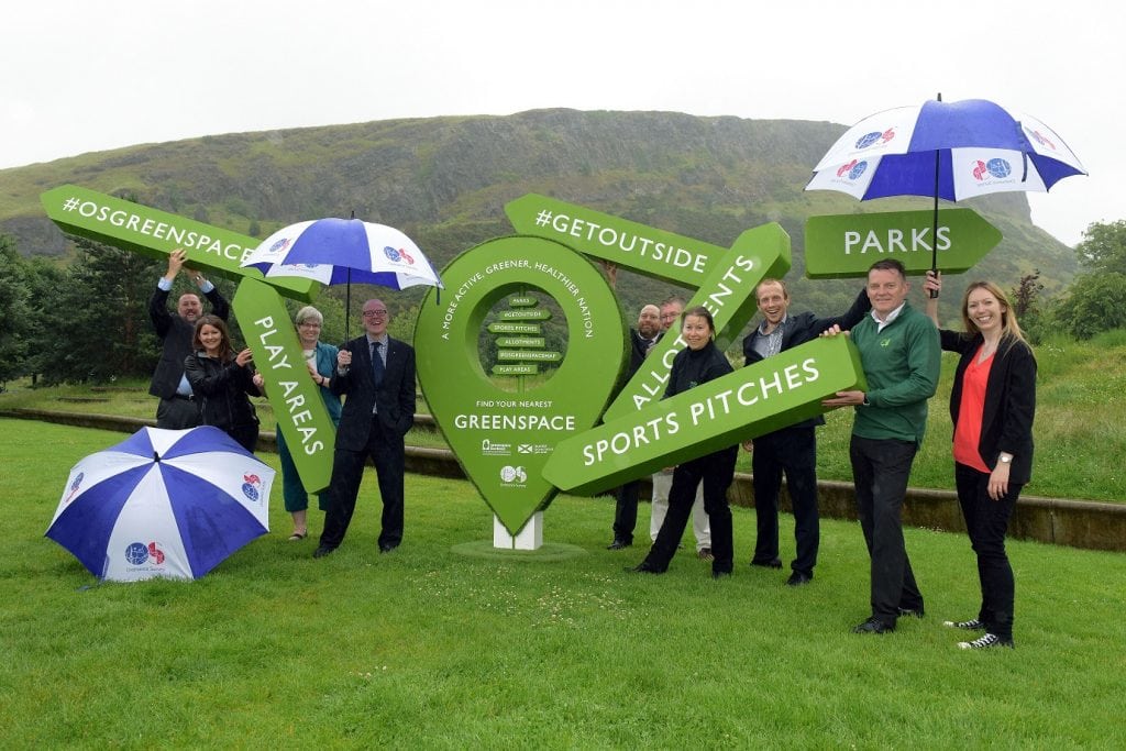 Mr Stewart and officials infront of Aurther's Seat at the launch of the Scottish Greenspace Map.