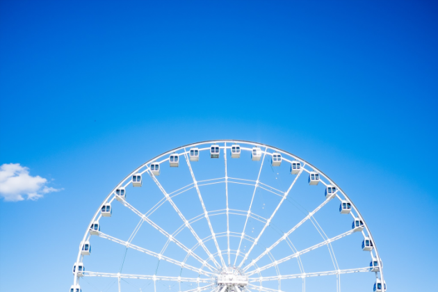 Ferris wheel against a blue sky