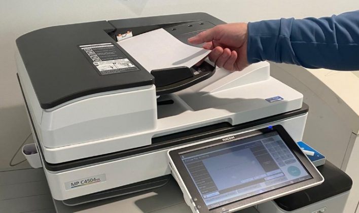 Taking paper from a multifunctional device