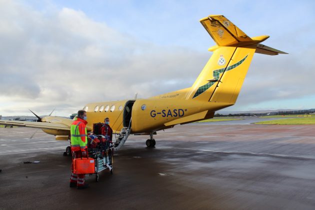 Air ambulance aircraft and staff.