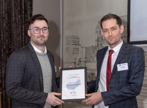 Kyle being presented with his Training Matters Modern Apprentice of the Year 2022